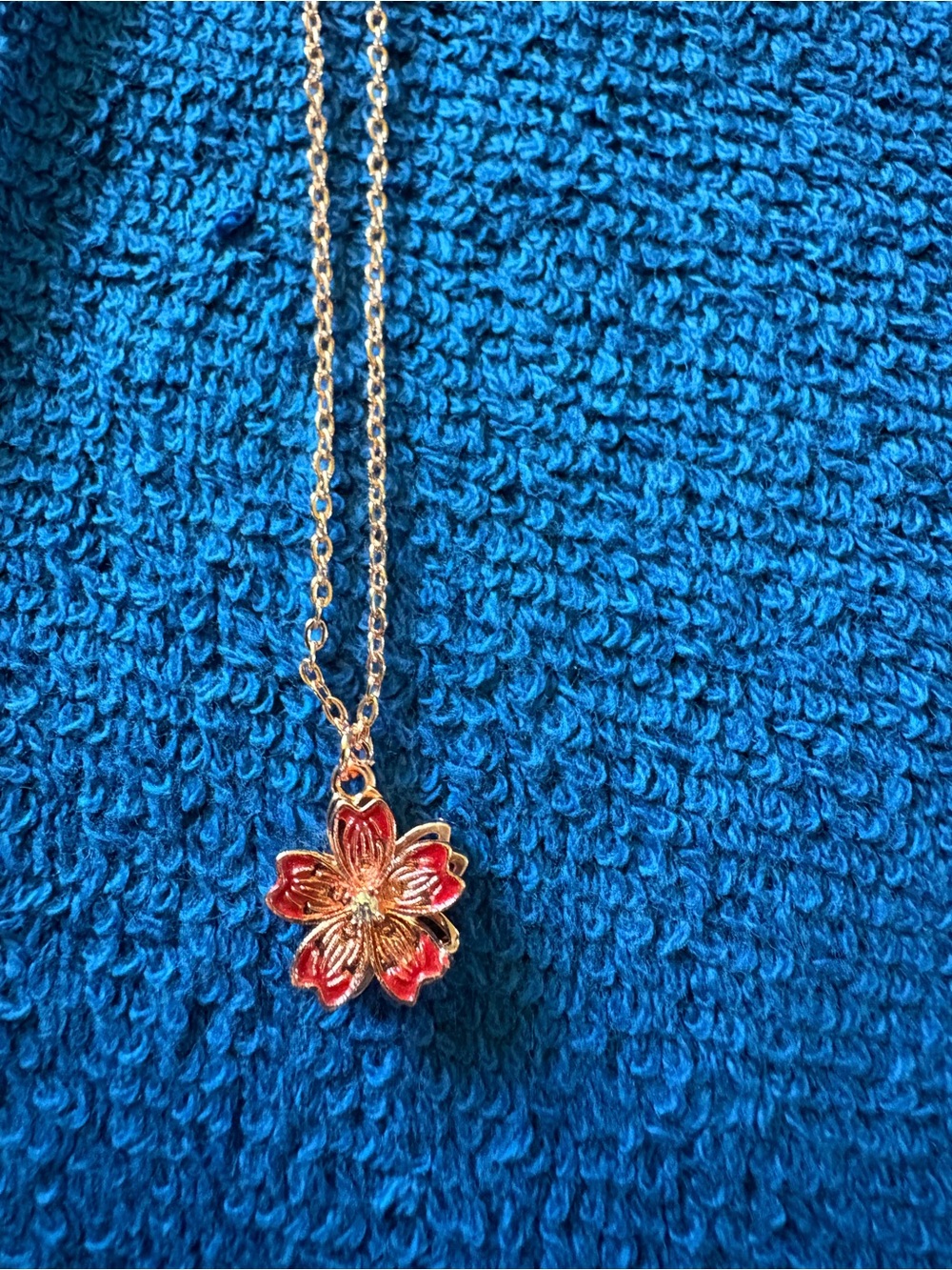 Gold Floral Pendant Necklace with Red Enamel Flower